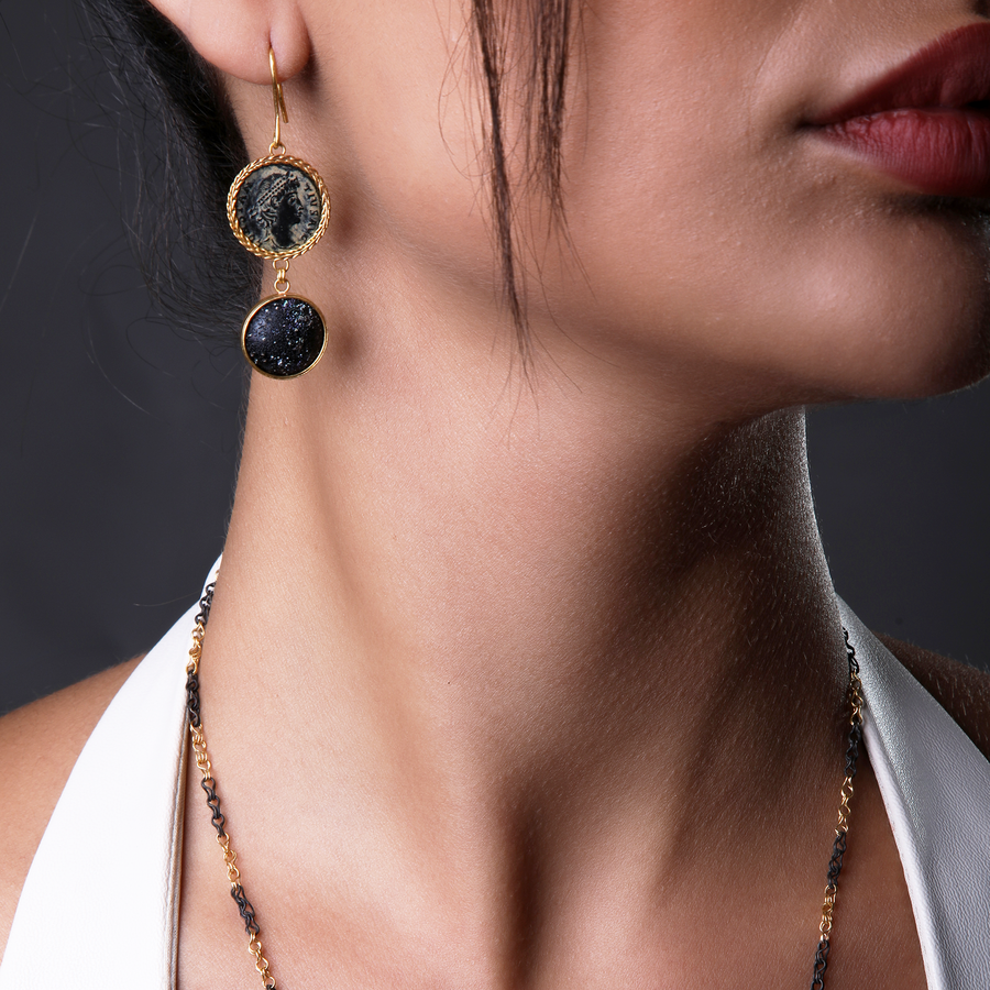 The Emperor Earrings featuring authentic ancient Roman coin and blue Roman glass, set in 21 karat gold.