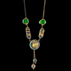 Elegant necklace featuring ancient Phoenician glass beads on a gold and silver lock chain.