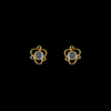 Skylit light blue sapphire stud earrings set in 21 karat gold, offering elegance and timeless beauty.