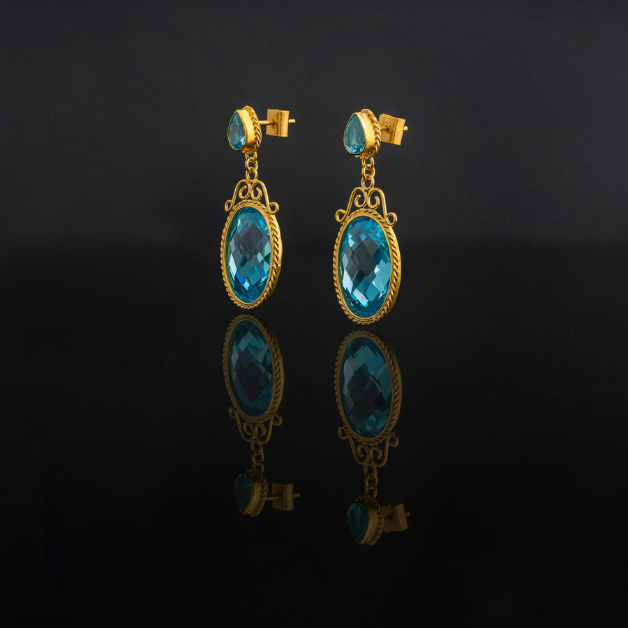 Blue Topaz stones set with 21 karat gold jewelry earrings design side view | ZAMAN HANDMADE JEWELRY