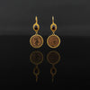 Red Garnet and bronze coin set with 21 karat gold jewelry design front view | ZAMAN HANDMADE JEWELRY